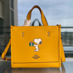 Coach Snoopy Versatile Handbag - Yellow